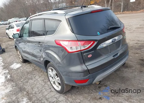 2015 Ford Escape Titanium z USA, uszkodzony, nr VIN 1FMCU0JX7FUA36374